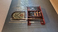 A pool cue rack that i made for my brother as a birthday present! Made from Pau Ferro and Walnut