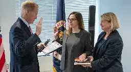 The joy of seeing a NASA official swear her oath on Carl Sagan's "Pale Blue Dot"