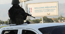 Gangs in Haiti try to seize control of main airport as thousands escape prisons: "Massacring people indiscriminately"