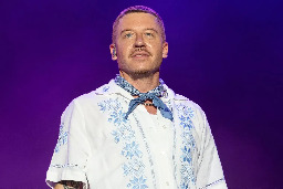 Macklemore clarifies 'f--- America' comments: 'I'm not ok. I haven't been'