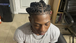 A Black student was suspended for his hairstyle. The school says it wasn't discrimination