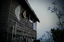 Eerie dusk settling on the cabin by the lake